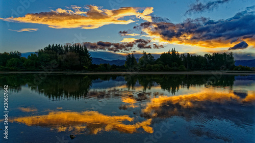 Fototapeta Naklejka Na Ścianę i Meble -  Sunset at the Kumeras reflection, Motueka, New Zealand