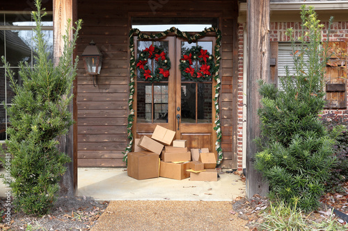 Fotografie Boxes on front porch during holiday shopping season