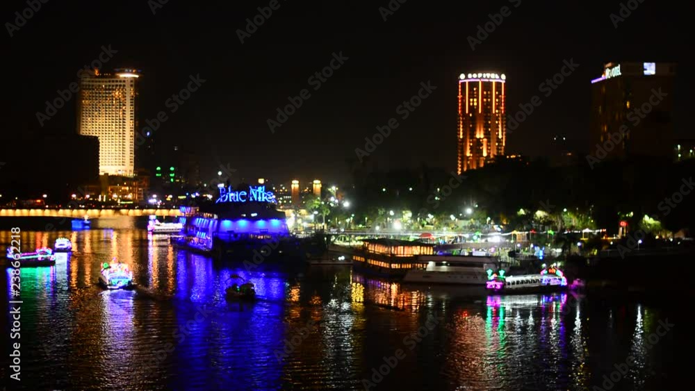 Video of the Nile river in Cairo Egypt during night showing reflections to water and building on both sides Video of the Nile river in Cairo Egypt during night showing reflections to water and building on both sides