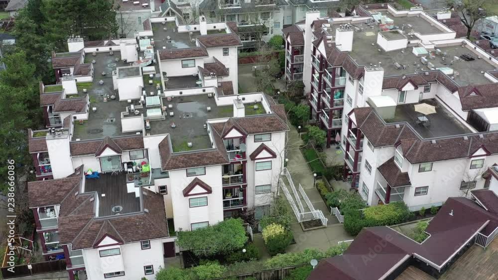 Apartment buildings in suburb at Fall in the north America. Luxury houses with nice landscape. Aerial drone view. Apartment buildings in suburb at Fall in the north America. Luxury houses with nice landscape. Aerial drone view.