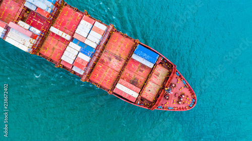 Aerial view container ship, Carrying container for import export business logistic and transportation of International by freight cargo ship in the open sea.