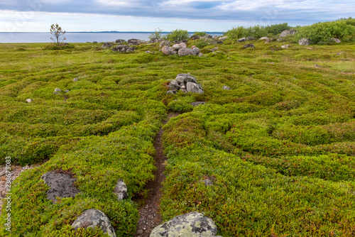 Stone labyrinths on the Bolshoy Zayatsky Island. Solovetsky archipelago, White Sea, Russia photo