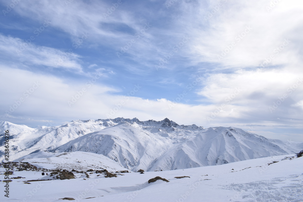 Mount Apharwat at a height of 4390 metres in Gulmarg, Kashmir, India. It lies in Pir Panjal mountain range. The LOC is few kms away from here & it remains covered with heavy snow throughout the year.