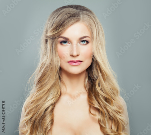Beautiful girl with blonde hair. Fashion model woman portrait