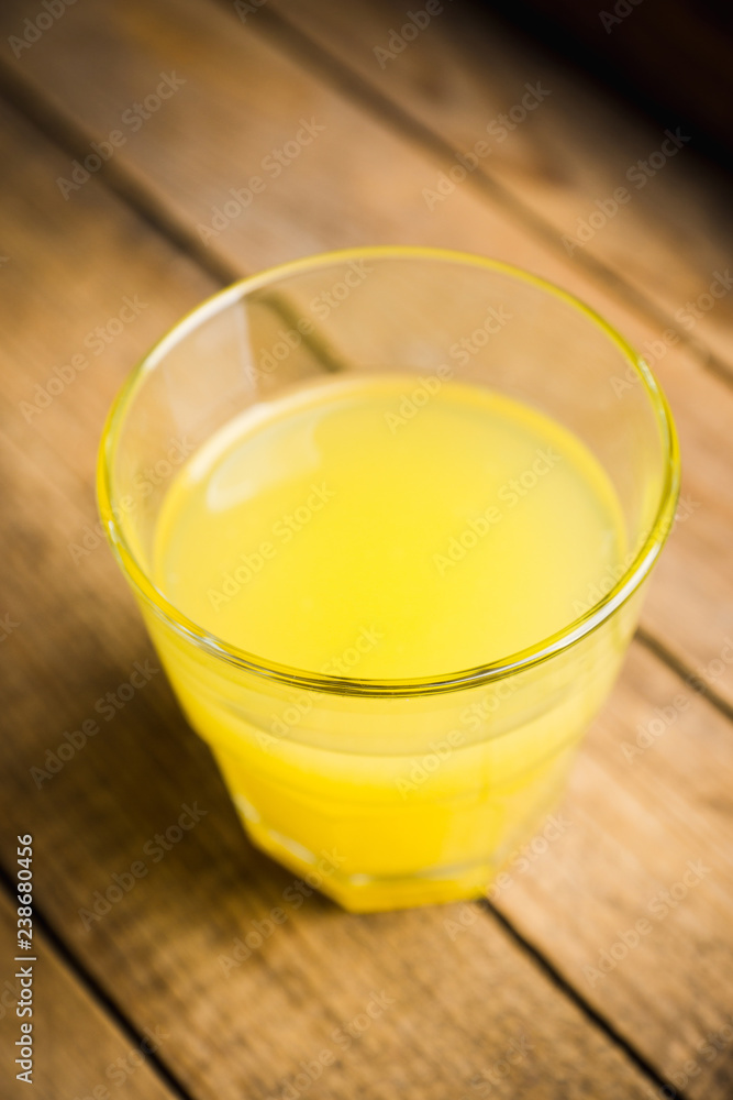 Old fashioned citrus beverage with spices. Selective focus. Shallow depth of field. Old fashioned citrus beverage with spices. Selective focus. Shallow depth of field.