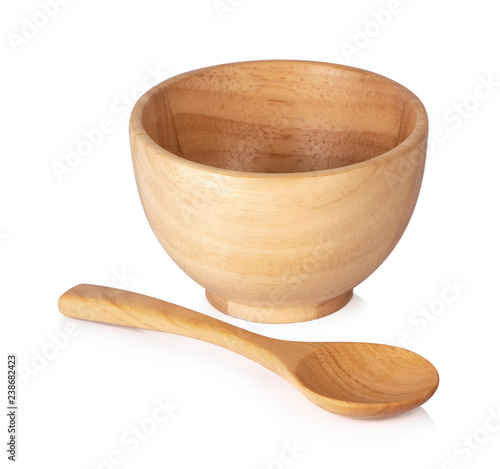 Cups and wooden spoons on white background