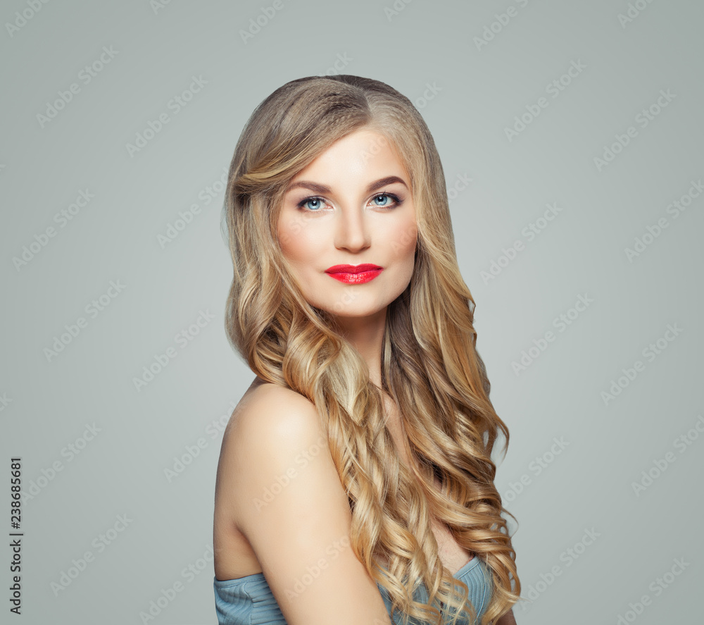Fototapeta premium Perfect girl. Cute woman blonde with long fair hair and clear skin. Facial treatment, haircare and cosmetology concept