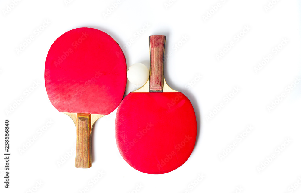 Two table tennis rackets and a ball isolated Two table tennis rackets and a ball isolated