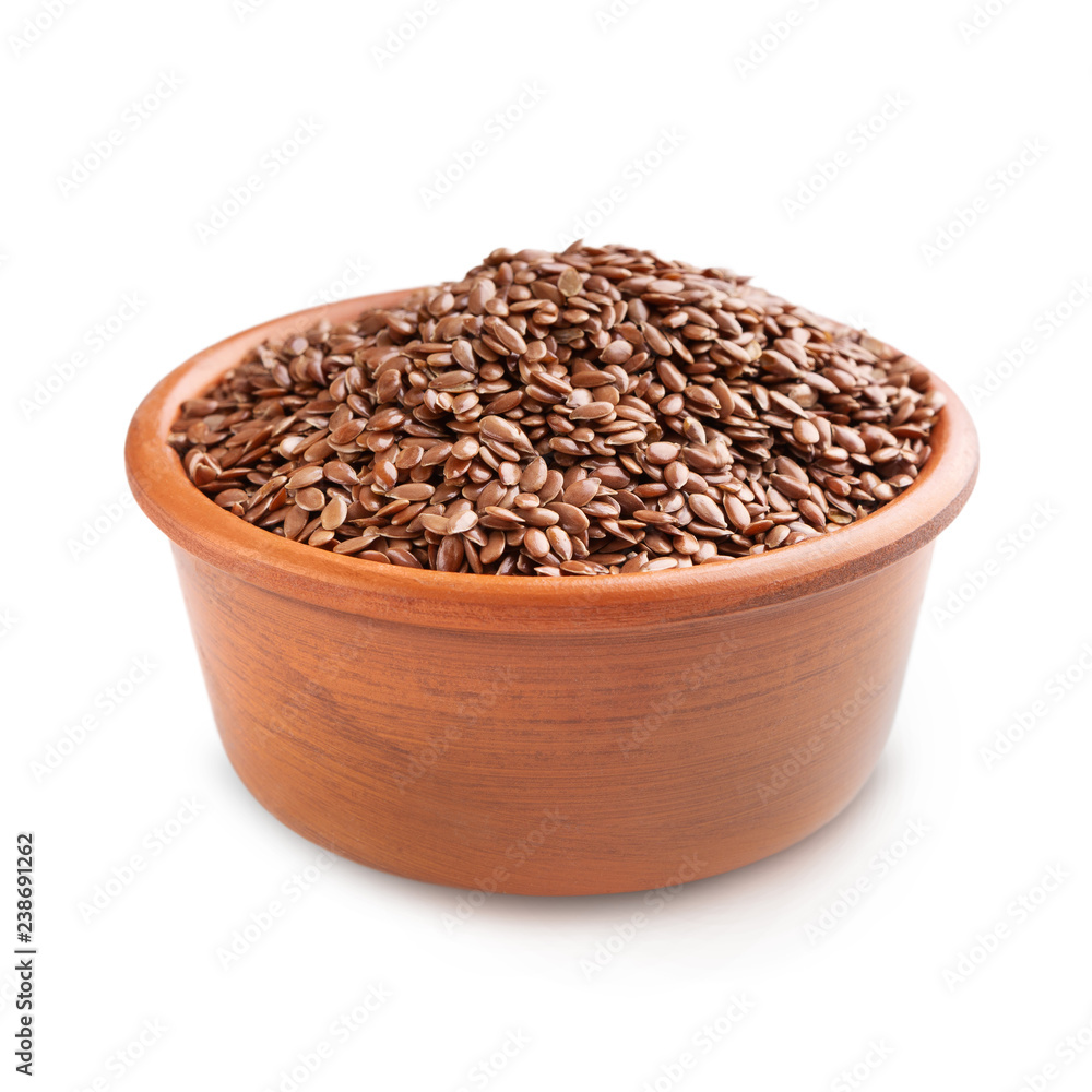 Flax seeds in ceramic bowl isolated on white Flax seeds in ceramic bowl isolated on white