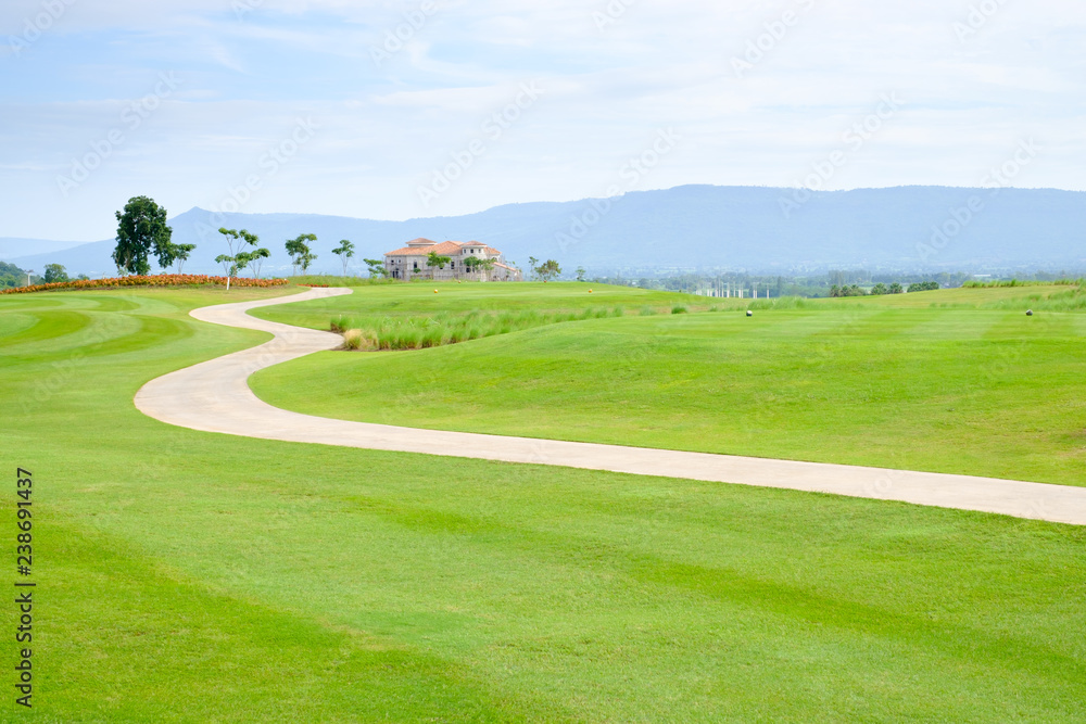 walkway on the green field in the golf club with beautiful view.