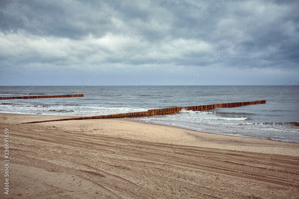 Seascape with moody sky, color toning applied.