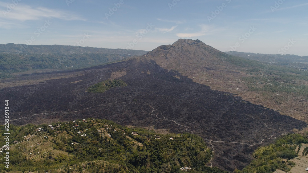 Aerial view landscape after volcanic eruption volcano Batur mountain landscape with volcano sky and clouds Bali, Indonesia. Travel concept.