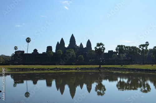 The Angkor Wat temple with five towers is reflected in the lake. Angkor, Cambodia. © Irina Kulikova