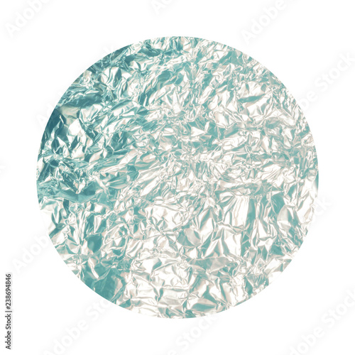 Round background with blue crumpled foil texture isolated on white