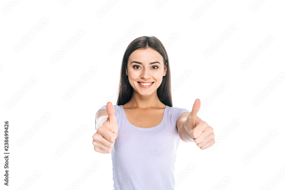portrait of smiling woman showing thumbs up isolated on white portrait of smiling woman showing thumbs up isolated on white