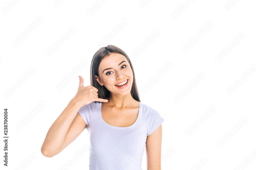 portrait of smiling woman showing call sign isolated on white portrait of smiling woman showing call sign isolated on white