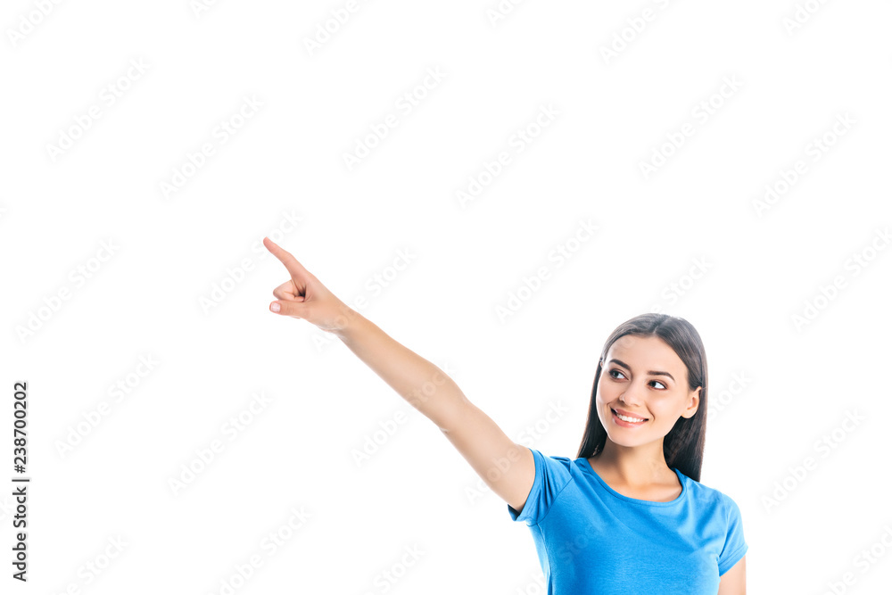 portrait of attractive cheerful woman pointing away isolated on white portrait of attractive cheerful woman pointing away isolated on white