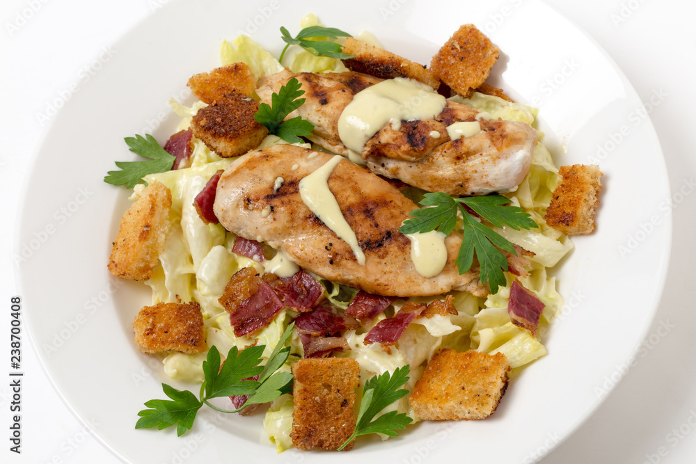 Chicken caesar salad high angle view Chicken caesar salad high angle view