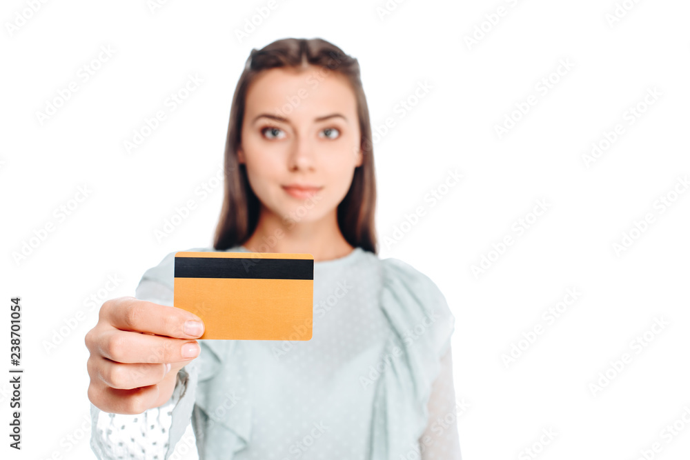portrait of young woman showing credit card isolated on white portrait of young woman showing credit card isolated on white