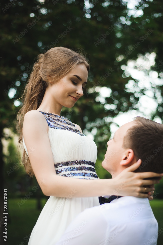 Romantic wedding moment, couple of newlyweds smiling portrait, bride and groom hug. Romantic wedding moment, couple of newlyweds smiling portrait, bride and groom hug.