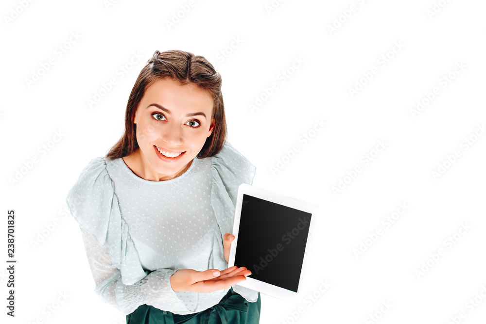 high angle view of smiling woman pointing at tablet with blank screen isolated on white high angle view of smiling woman pointing at tablet with blank screen isolated on white
