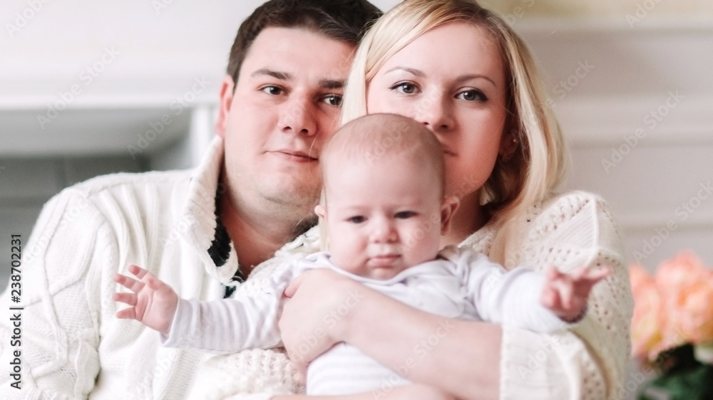 happy family on the background of a cozy living room happy family on the background of a cozy living room