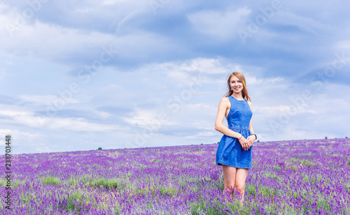 Fototapeta Naklejka Na Ścianę i Meble -  Beautiful girl on the lavender field