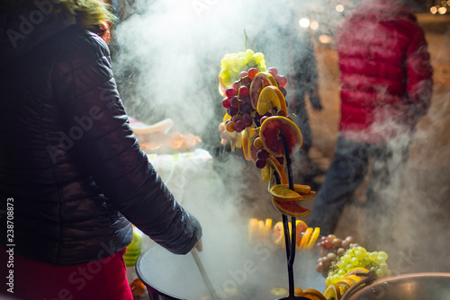 making fruity mulled wine at Christmas market in Budapest 