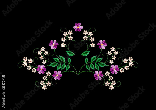 
Delicate pattern for embroidery bouquet assembled from twigs with green leaves with white and purple flowers on a black background
 

