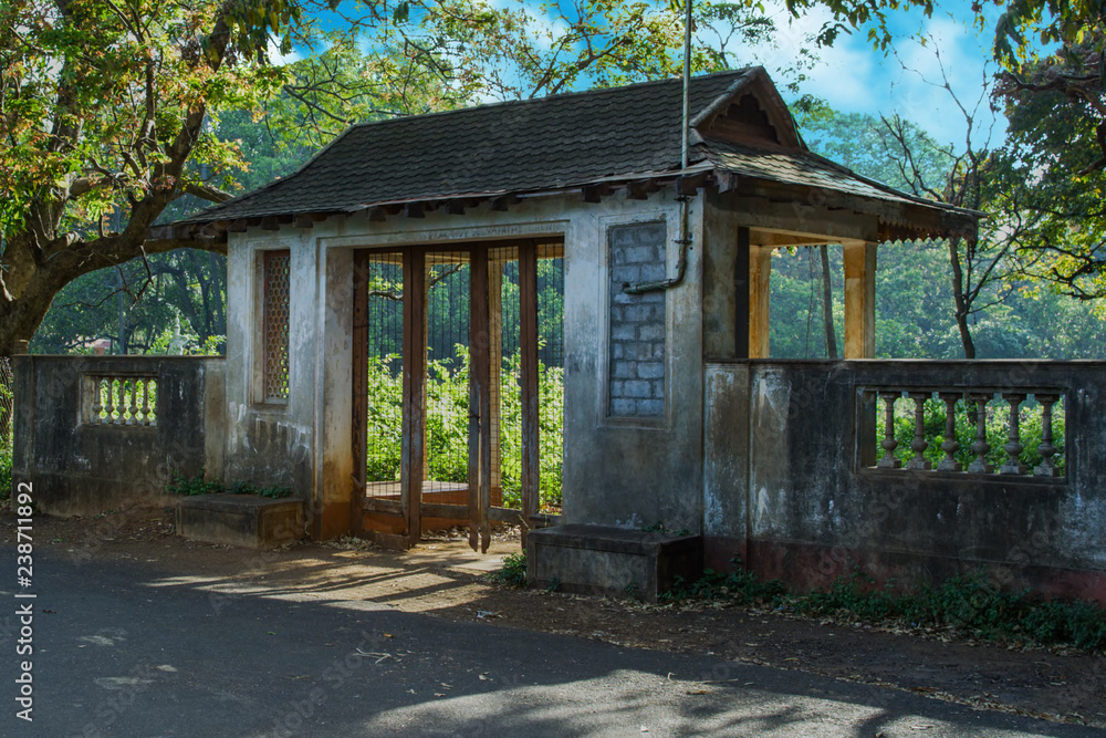 Exterior view of a house with locked gate