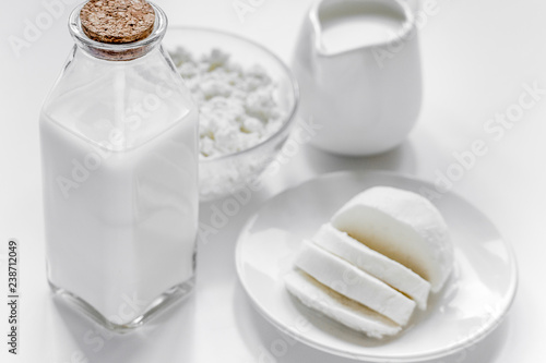 dairy products for proteic meal on white table background