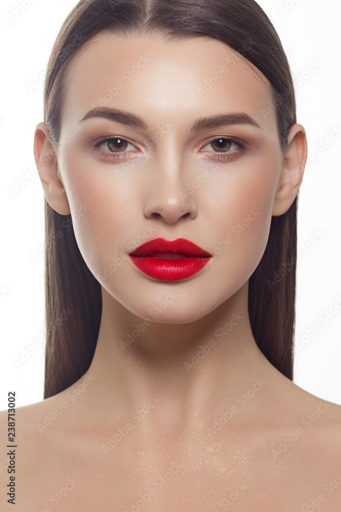 Close-up portrait of sexy european young woman model with classic glamour make-up and red lipstick. Dark long hairstyle, christmas makeup, dark eyeshadows, bloody red lips with gloss Close-up portrait of sexy european young woman model with classic glamour make-up and red lipstick. Dark long hairstyle, christmas makeup, dark eyeshadows, bloody red lips with gloss