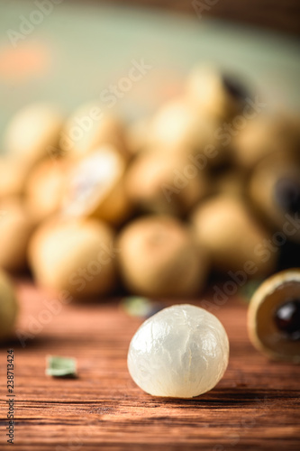 Longan exotic fruits from tropical countries on table. Sweet translucent flesh