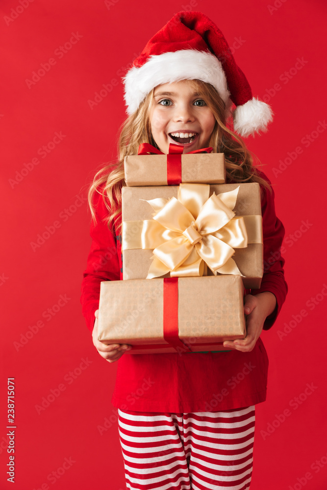 Cheerful little girl wearing Christmas costume Cheerful little girl wearing Christmas costume