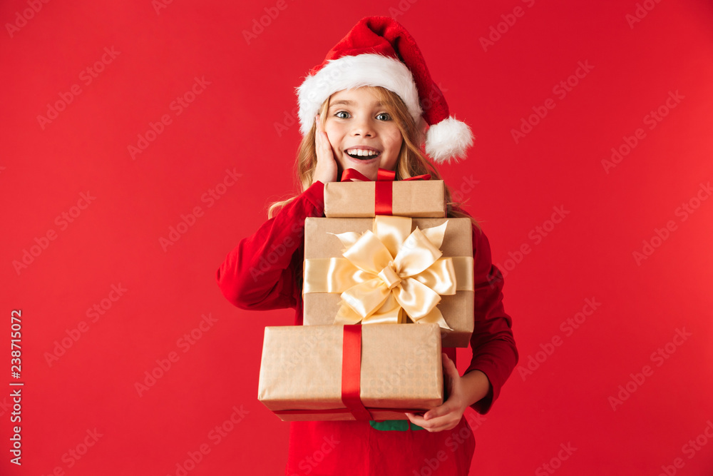 Cheerful little girl wearing Christmas costume Cheerful little girl wearing Christmas costume