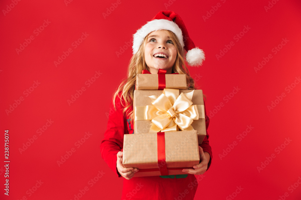 Cheerful little girl wearing Christmas costume Cheerful little girl wearing Christmas costume