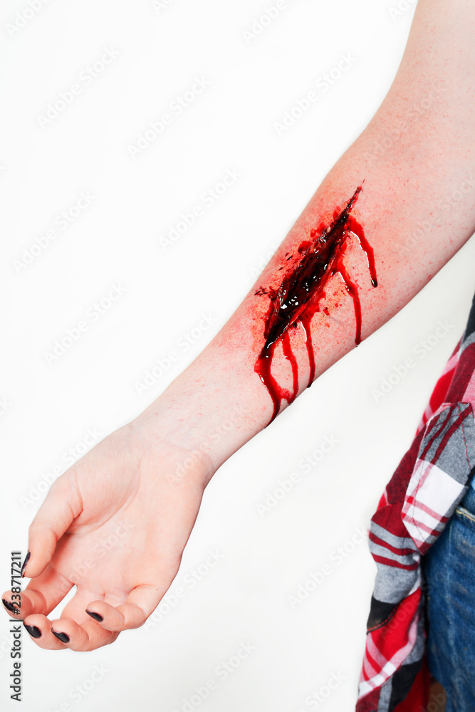 cut wound blood on hand cut sutsyd vein professional makeup flows blood  Stock Photo | Adobe Stock