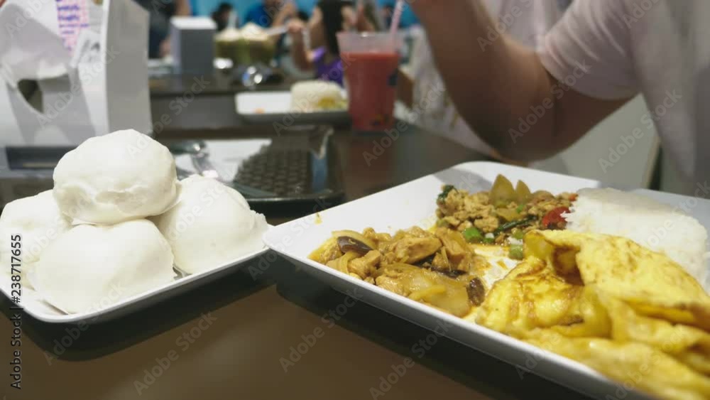 close-up. someone eats a dish of asian cuisine in a restaurant. close-up. someone eats a dish of asian cuisine in a restaurant.