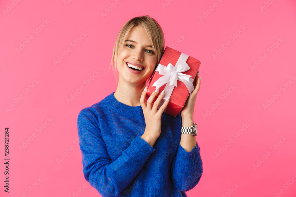 Cheerful young blonde woman wearing sweater Cheerful young blonde woman wearing sweater