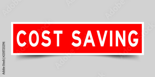 Square red color sticker with word cost saving on gray background