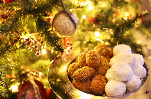 greek melomakarona and kourabies - traditional Christmas cookies with honey and nuts and sugar buns