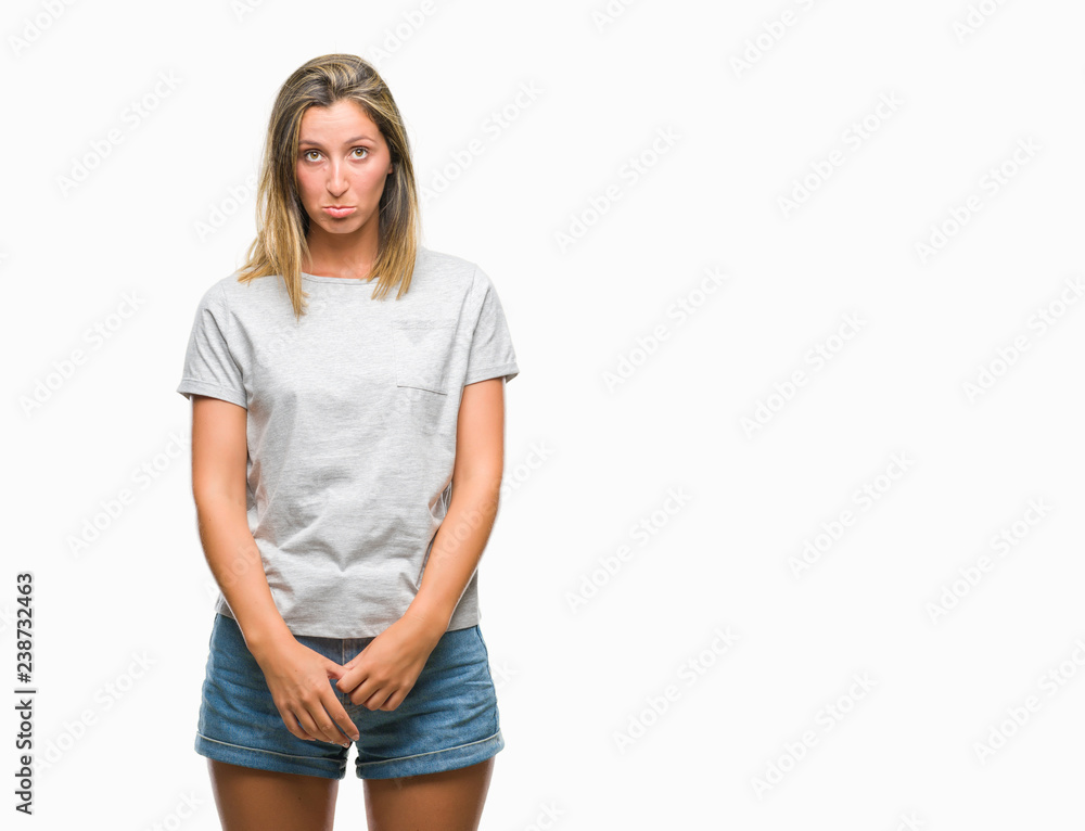 Young beautiful woman over isolated background depressed and worry for distress, crying angry and afraid. Sad expression. Young beautiful woman over isolated background depressed and worry for distress, crying angry and afraid. Sad expression.