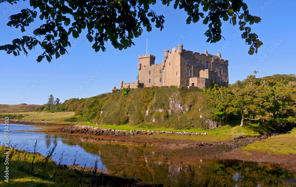 Dunvegan, Scotland / United Kingdom - August 2014: The Dunvegan Castle on the shore of Loch Dunvegan