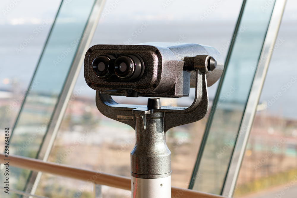 Tourist binoculars. Binoculars telescope on observation deck for tourist. Tourist binoculars. Binoculars telescope on observation deck for tourist.