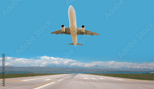 Airplane take off from the airport - Travel by air transport 