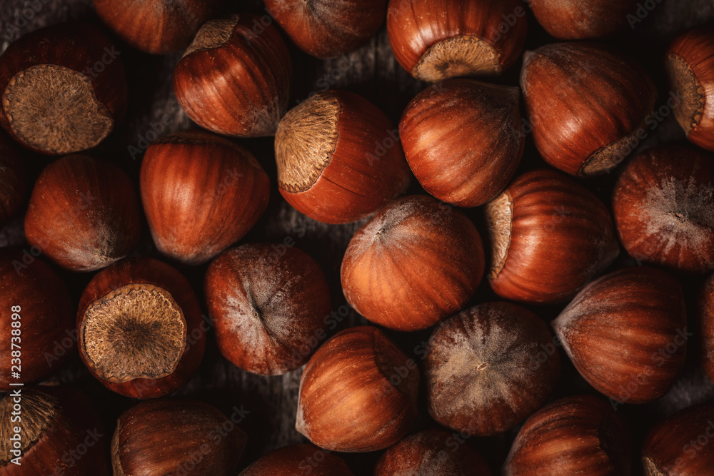 Obraz premium full frame of shelled hazelnuts as backdrop