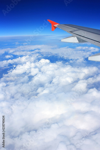 Wing aircraft in the blue sky