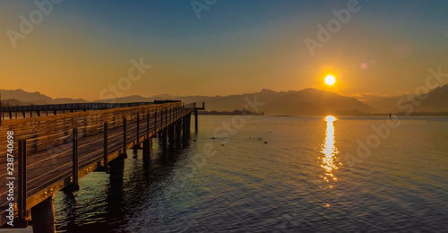 Stunning sunset on the shores of the Upper Zurich Lake near Rapperswil, Switzerland