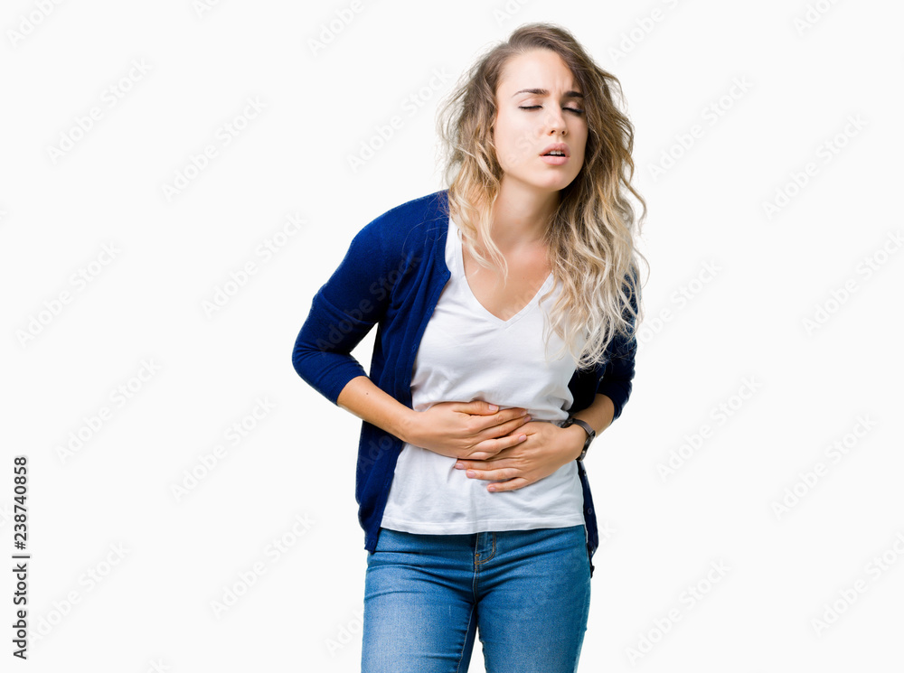 Beautiful young blonde woman over isolated background with hand on stomach because indigestion, painful illness feeling unwell. Ache concept. Beautiful young blonde woman over isolated background with hand on stomach because indigestion, painful illness feeling unwell. Ache concept.
