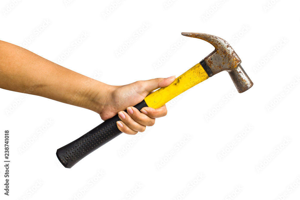 Cropped of a hand holding iron hammer isolated on white background include clipping path. Cropped of a hand holding iron hammer isolated on white background include clipping path.
